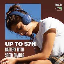 Lifestyle photo: person wearing Blue JBL Tune 520BT Wireless On-Ear Headphones