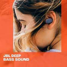 User wearing Black JBL Tune Buds during a workout
